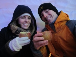 Warm Japanese plum wine in frozen carved out apples!